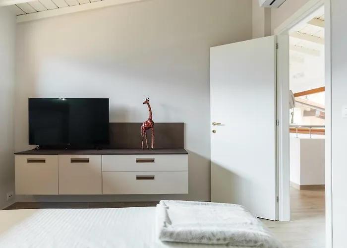 Mansarda I Cipressi Apartment *